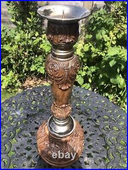 A Vintage pair of Maitland Smith Candlesticks hand carved in the Phillipines