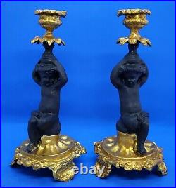 Black & gold gilt metal vintage Art Deco antique pair of cherub candlesticks
