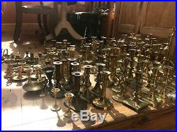 JOB LOT OF VINTAGE BRASS CANDLESTICKS. Variety of sizes, 106 items in total
