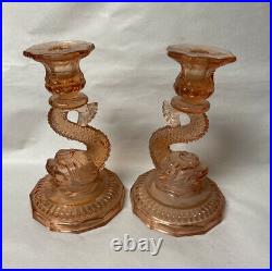 PAIR of VINTAGE or ANTIQUE PINK GLASS DOLPHIN FISH CANDLESTICKS