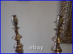 Pair of vintage silver plated embossed church candlestick table lamps