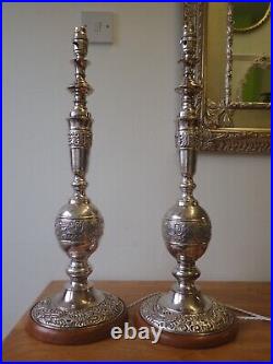 Pair of vintage silver plated embossed church candlestick table lamps