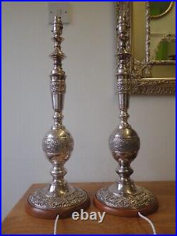 Pair of vintage silver plated embossed church candlestick table lamps