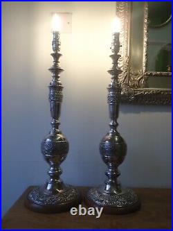 Pair of vintage silver plated embossed church candlestick table lamps