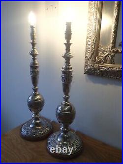 Pair of vintage silver plated embossed church candlestick table lamps