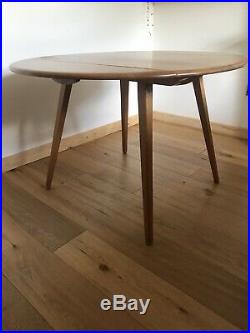 Round/oval drop-leaf vintage Ercol elm dining table With X4 Candlestick Chairs