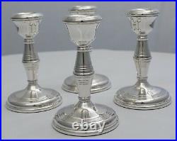 Set of four 4 ¼ vintage loaded sterling silver Candlesticks, B. 1968/70, 535g