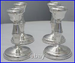 Set of four 4 ¼ vintage loaded sterling silver Candlesticks, B. 1968/70, 535g