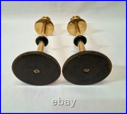 Unusual pair of mid 20th Century vintage brass and ebonised candlesticks