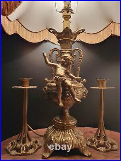 Vintage Brass Lamp with Cherub Sculpture with pair of brass candlesticks