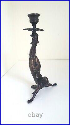 Vintage Chinese bronze figural candlestick in the manner of an acrobat