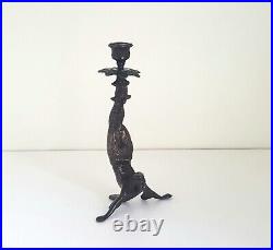 Vintage Chinese bronze figural candlestick in the manner of an acrobat