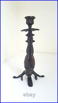 Vintage Chinese bronze figural candlestick in the manner of an acrobat