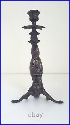 Vintage Chinese bronze figural candlestick in the manner of an acrobat