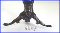 Vintage Chinese bronze figural candlestick in the manner of an acrobat