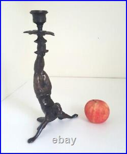 Vintage Chinese bronze figural candlestick in the manner of an acrobat