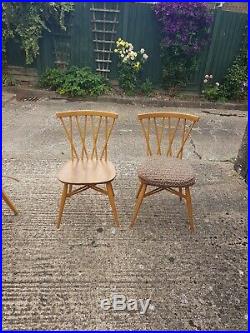 Vintage Ercol table & 4 chairs. Includes pair of Candlestick chairs
