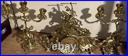 Vintage brass Clock on horseback clock and 2 X candle sticks set of 3