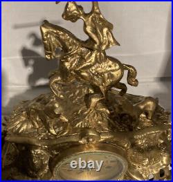 Vintage brass Clock on horseback clock and 2 X candle sticks set of 3