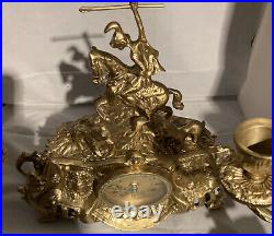 Vintage brass Clock on horseback clock and 2 X candle sticks set of 3