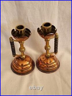 Vintage pair of Copper and Brass Candlesticks designed by Christopher Dresser